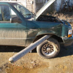 Fence post impales car!